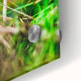 Large abstract wall art depicting spring, with vibrant green and yellow tones on acrylic glass.