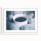 Abstract art print depicting a winter scene in muted blue and white tones on a framed canvas.