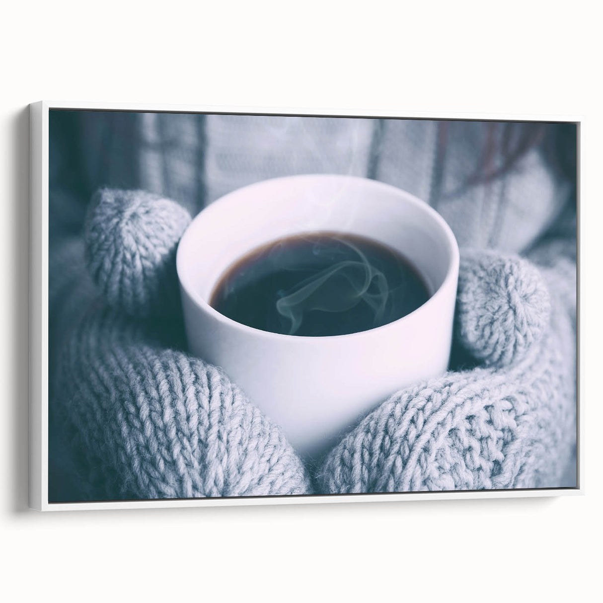 Vintage poster art of a winter scene on framed canvas, featuring a snowy landscape in muted blue and white tones.