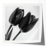 Glossy floral and botanical photo print mockup set displayed on a wooden table, showcasing vibrant colors and intricate details of nature-inspired designs.