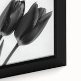 Close-up of a framed botanical canvas featuring intricate floral designs in vibrant colors, perfect for home decor enthusiasts. Ideal for adding a touch of nature to any room.