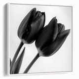 Framed botanical canvas artwork showcasing intricate floral designs with a white border, perfect for modern home decor. Side view highlights the frame's sleek finish.