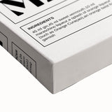 Large art of a black and white landscape painting on stretched canvas, featuring a serene mountain scene.