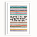 Abstract art print featuring a blend of colorful geometric shapes, framed in white, ideal for dining room decor.