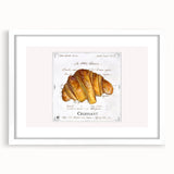 Abstract art print of assorted pastries in muted earth tones, framed in white, suitable for dining room decor.