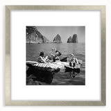 Textured abstract art print in muted earth tones on a framed silver mat, ideal for bedroom wall decor.