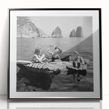Large abstract wall art featuring silhouetted figures and food motifs in black and white, framed in acrylic.