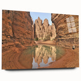 Large abstract wall art depicting an Algerian landscape in muted earth tones on acrylic glass.