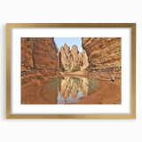 Textured abstract art print depicting a serene Algerian landscape in muted earth tones on a framed canvas.