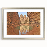 Abstract art print of Algerian scenery in muted earth tones on a framed silver mat.