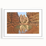 Extra large abstract art print depicting a textured African scenery in muted earth tones, framed with a white mat.