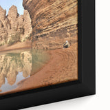 Extra large framed canvas featuring a textured, colorful African scenery in black with vibrant accents.