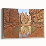 Vintage poster art of an Algerian landscape on framed canvas, featuring vibrant colors on a black background.