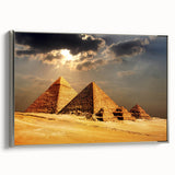 Vintage poster art of an Egyptian landscape on a silver-framed canvas, featuring vibrant colors, ideal for living room decor.