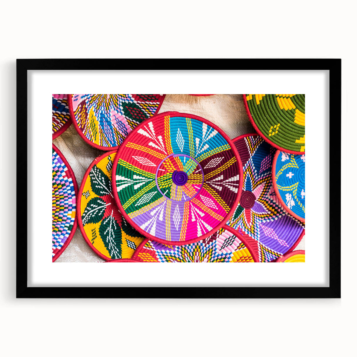 Extra large abstract art print depicting a colorful, textured Ethiopian landscape on a framed black canvas.