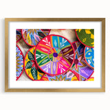Textured abstract art print of Ethiopian scenery in gold frame, with earthy color tones, suitable for bedroom decor.