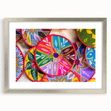 Abstract art print of an Ethiopian landscape in muted earth tones on a framed silver mat, suitable for dining room decor.