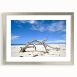 Abstract art print of a Kenyan landscape in muted earth tones on a framed silver mat, suitable for dining room decor.