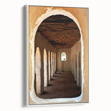 Framed canvas depicting a vintage-style Mali landscape in muted earth tones, ideal for bedroom wall art.