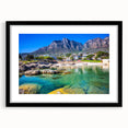 Extra large, textured abstract art print of an African scenery in vibrant colors on a framed black mat.