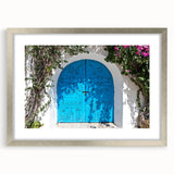 Textured abstract art print depicting a Tunisian landscape in earth tones, framed in silver, suitable for bedroom decor.