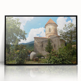 Large abstract wall art depicting an Asian scenery in muted earth tones, framed in black acrylic.