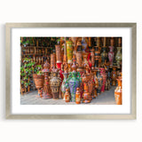 Textured abstract art print of a Bangladesh scenery in muted earth tones, framed in silver, ideal for bedroom art.