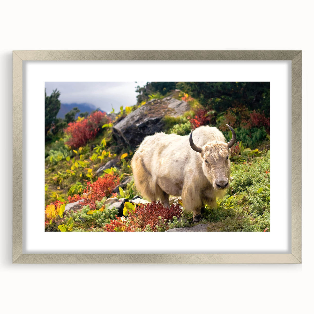 Textured art print of an abstract Bhutanese landscape in muted earth tones on a framed silver mat, ideal for bedroom art.