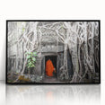 Large abstract wall art depicting a Cambodian scenery in muted earth tones, framed in black acrylic.