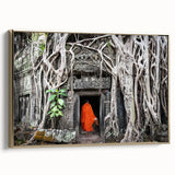 Framed canvas featuring a vintage-style landscape of a Cambodian scenery in muted gold and black tones.