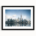 Colorful abstract art print of Shanghai skyline, featuring vibrant hues on a large framed canvas.