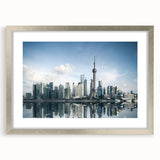 Textured art print of Shanghai skyline in muted gray and blue tones on a framed silver mat.