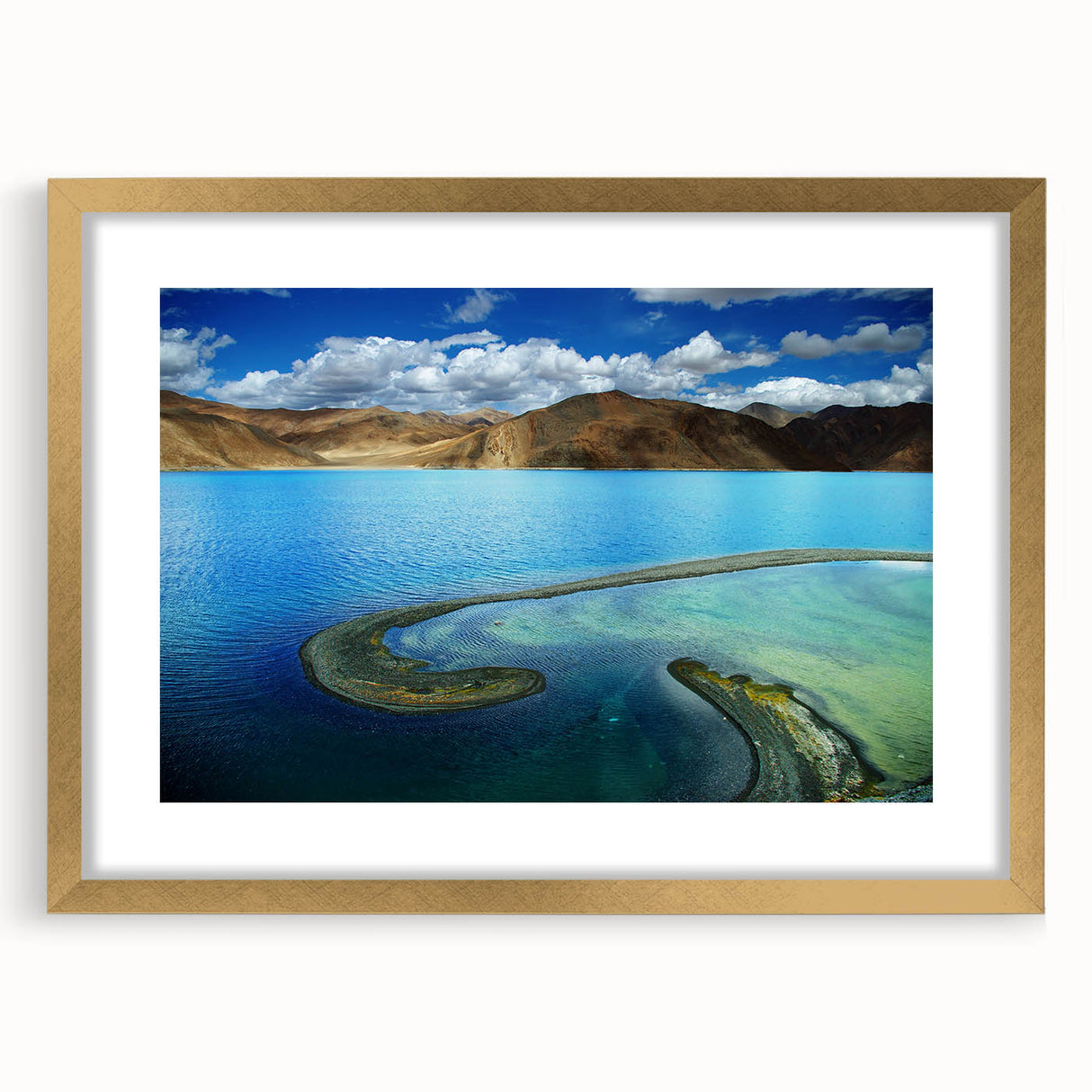 Extra large abstract art print of a textured Tibetan landscape in muted earth tones, framed in gold.