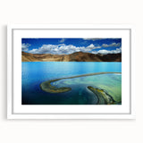 Abstract art print depicting a serene Tibetan landscape in muted earth tones on a framed canvas.