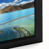 Extra large framed canvas featuring a textured depiction of a Tibetan landscape in black with colorful accents.