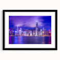 Abstract art print of Hong Kong skyline in vibrant colors on a large textured canvas, ideal for living room decor.