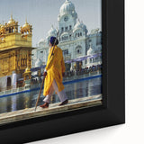 Extra large framed canvas featuring a textured depiction of a vibrant Indian scenery in black with colorful accents.