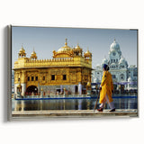 Framed canvas of a vintage-style Indian landscape painting, featuring vibrant colors on a black background.