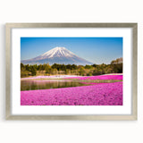 Textured art of Mount Fuji in muted blues and whites on a framed canvas, suitable for bedroom decor.