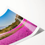 Extra large wall art featuring a line art depiction of Mount Fuji with floral elements in muted colors on a rolled canvas.