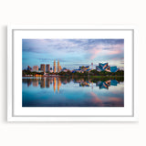 Abstract art print of a Malaysian landscape in muted earth tones on a framed white canvas, suitable for dining room decor.