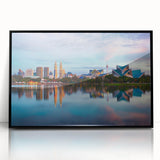 Large abstract wall art depicting a Malaysian landscape in muted earth tones on a framed acrylic.