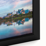 Extra large framed canvas featuring a textured depiction of a Malaysian landscape in vibrant colors on a black background.