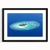 Extra large, colorful abstract art print of a Maldivian scenery on a textured canvas, framed in black.