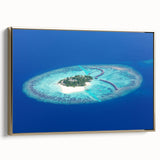 Framed canvas depicting a serene Maldivian landscape with lush greenery and calm waters, ideal for bedroom wall art.