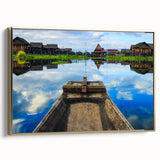 Framed canvas featuring a vintage-style landscape painting of a Myanmar scenery in muted gold and black tones.