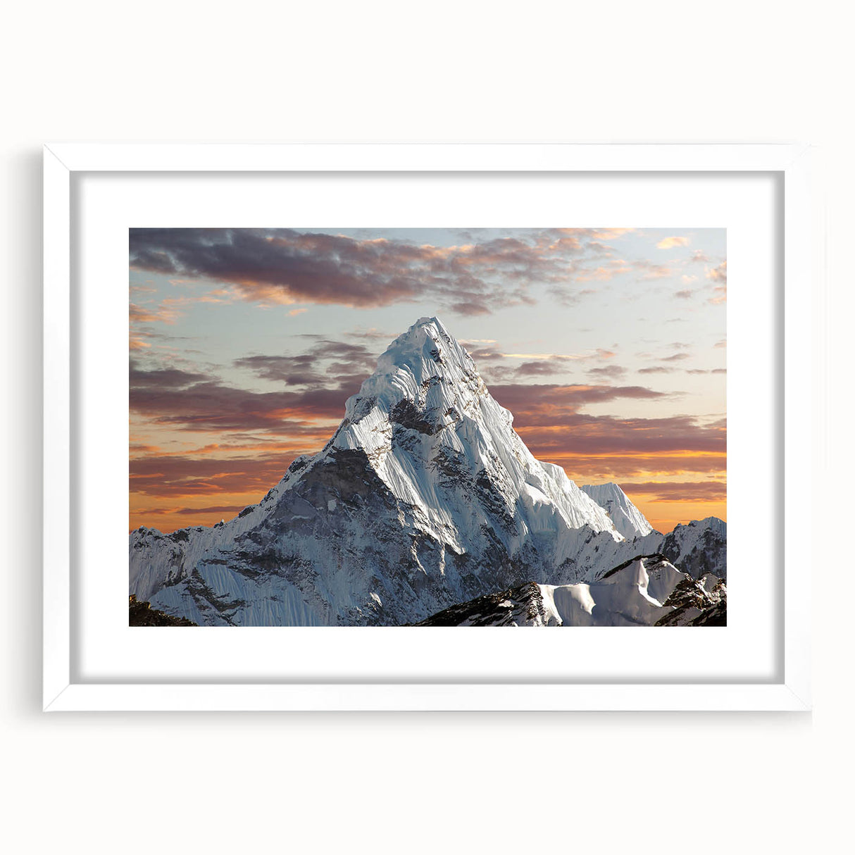 Abstract art print of Mount Everest in muted blue and gray tones, framed with a white mat.
