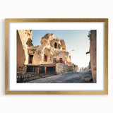 Extra large abstract art print depicting a textured Turkish landscape in earth tones, framed in gold.