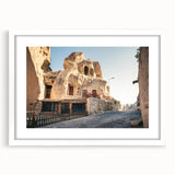 Abstract art print depicting a serene Turkish landscape in muted earth tones, framed with a white mat.