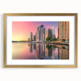 Textured abstract art print of Brisbane skyline in muted gold and blue tones on a framed mat, ideal for bedroom art.